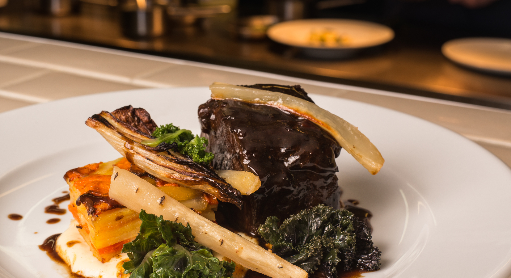 Slow cooked shorthorn beef, truffles, parmesan potato, vegetable gratin and salsify