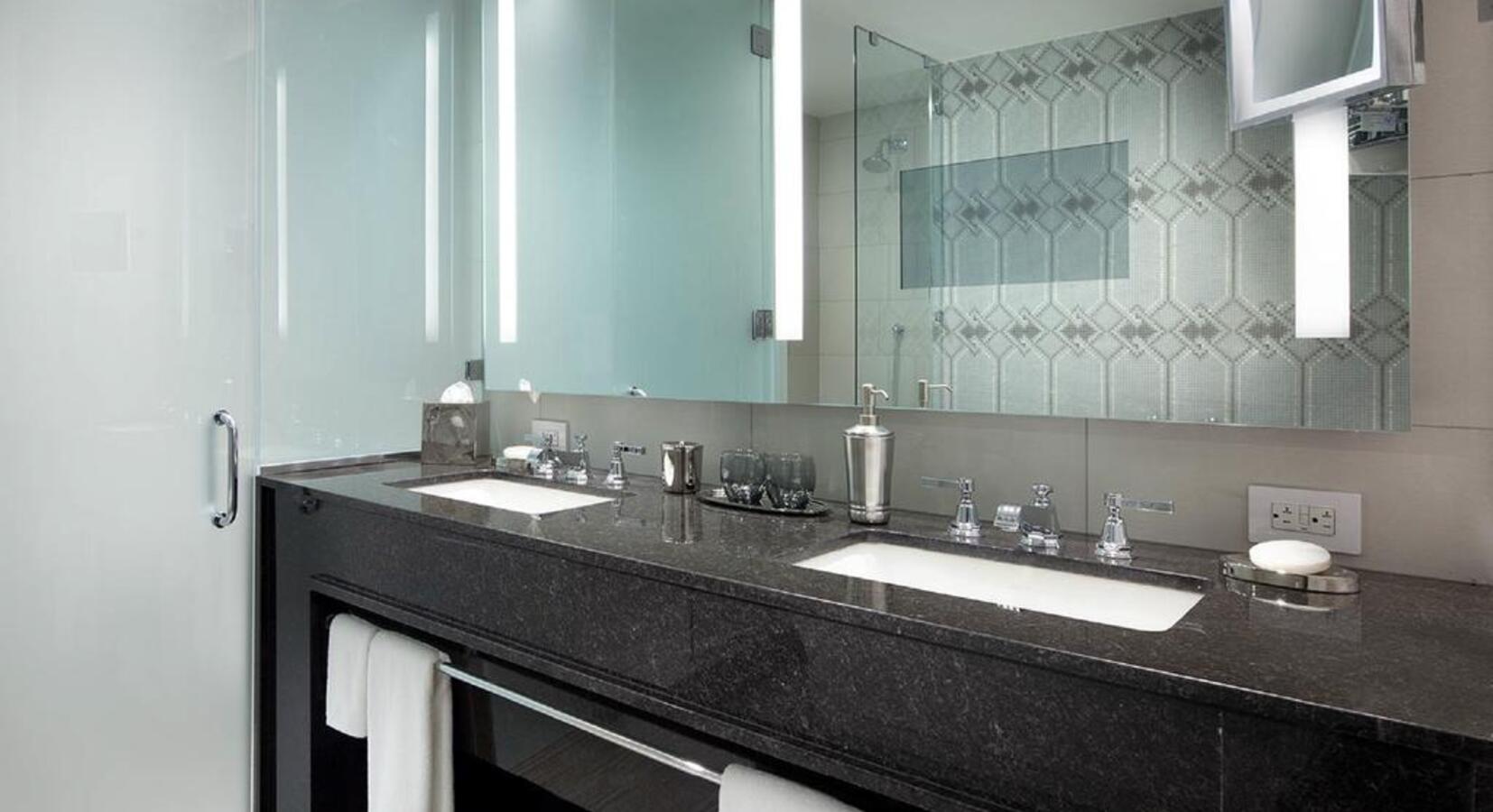 All Rooms Feature Modern Bathrooms, with Marble Surfaces