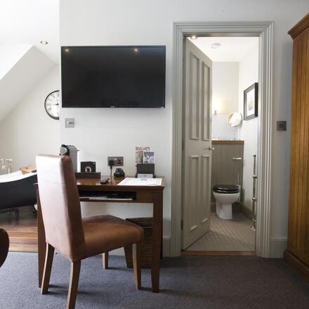 Guest room with feature bath tub