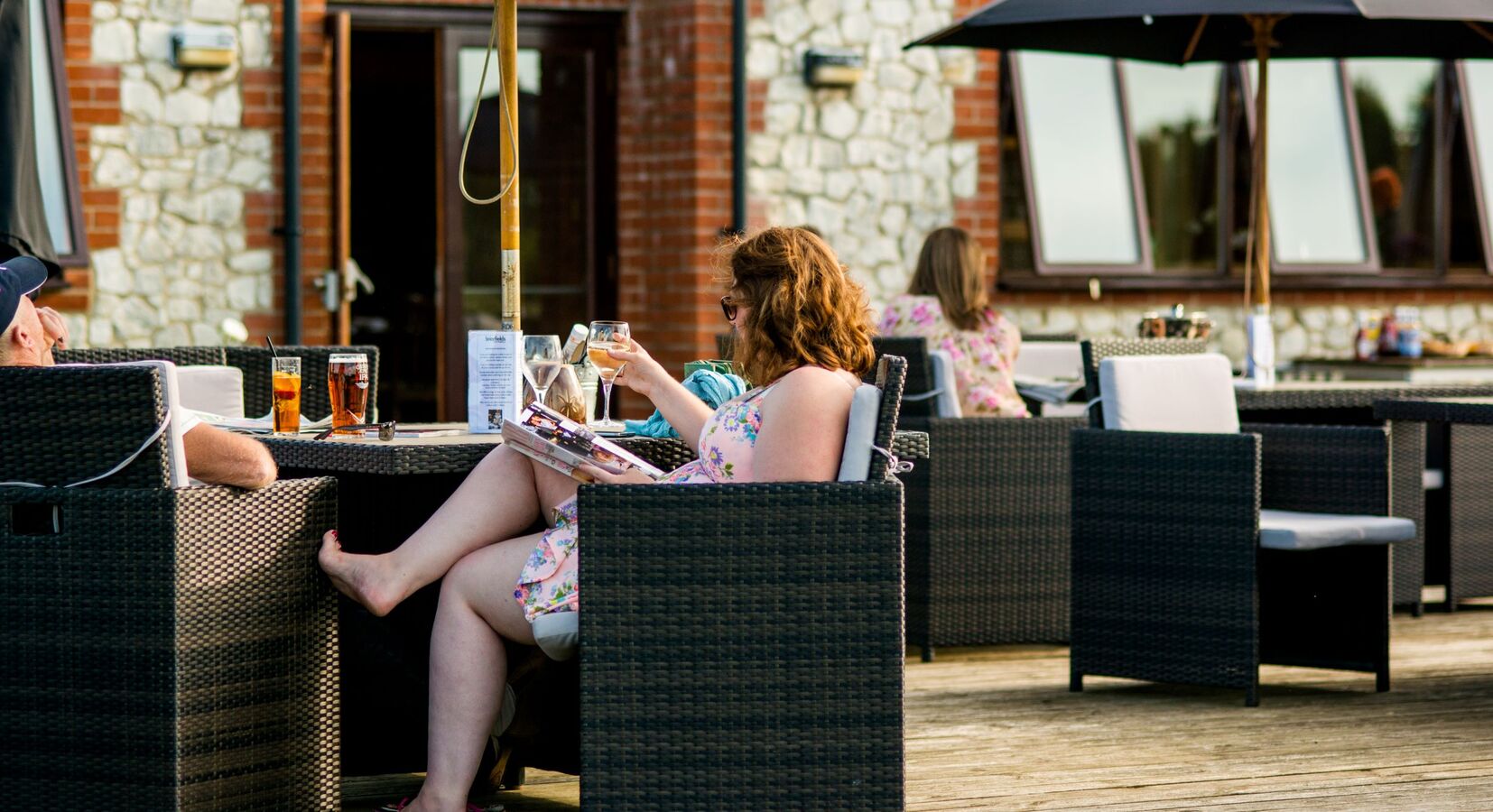 Enjoying drinks on the decking at Briarfields Coastal Hotel in North Norfolk