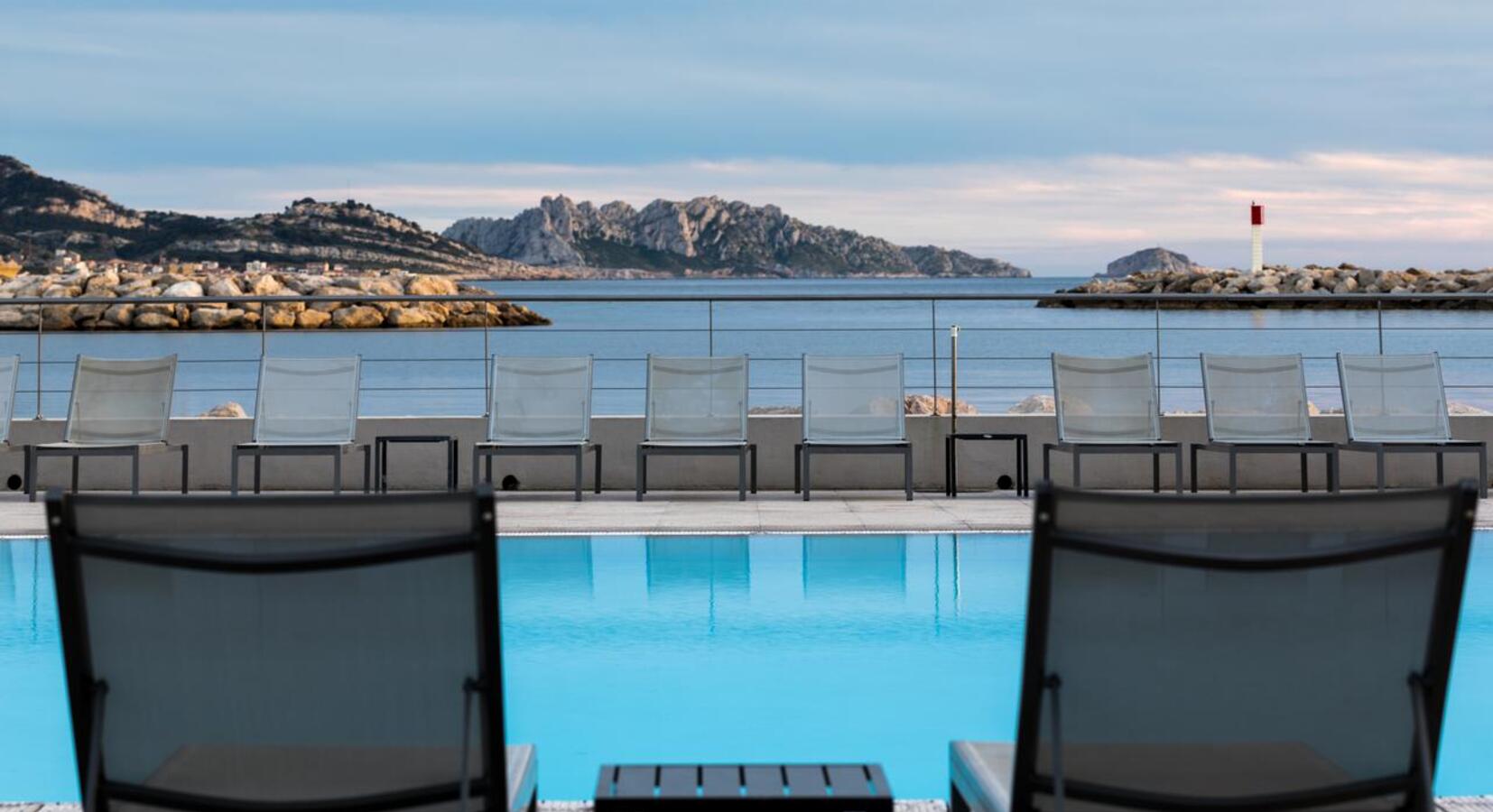 nHow's poolside with panoramic views of the Mediterranean