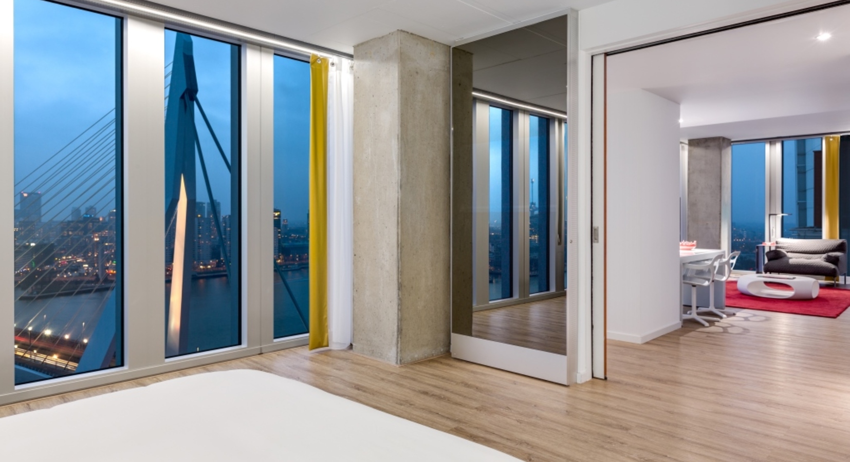 nhow Suite overlooking the river Maas, the Erasmusbridge and the skyline of the city