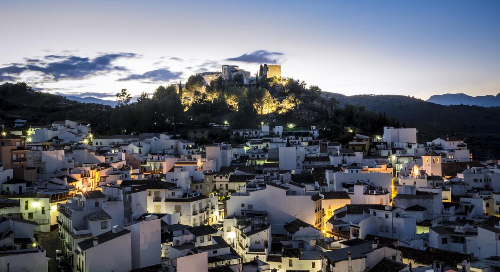 Castilo de Monda nestled on the hillside