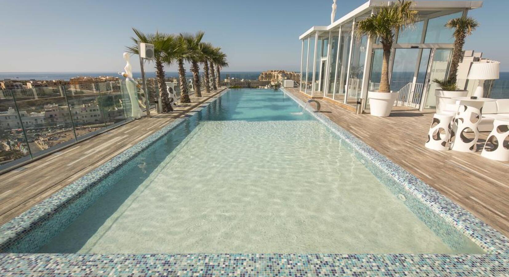 Pool on roof terrace with panoramic view of St Julian's