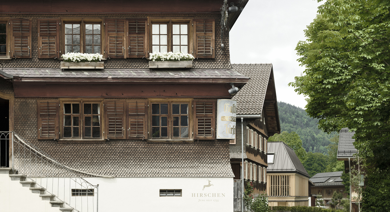 Hotel Gasthof Hirschen with Badehaus behind