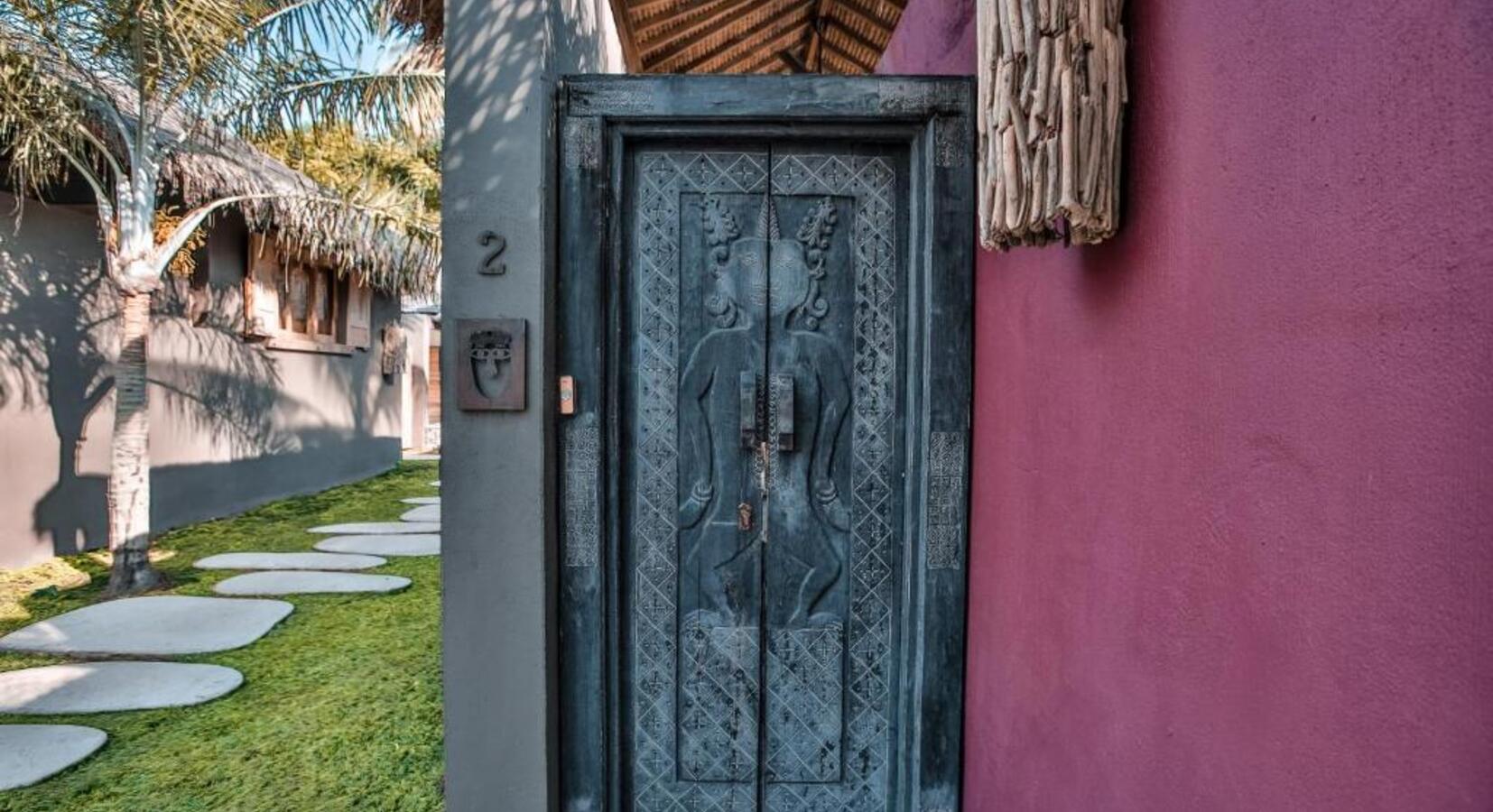 Hand-carved Door to Villa 2