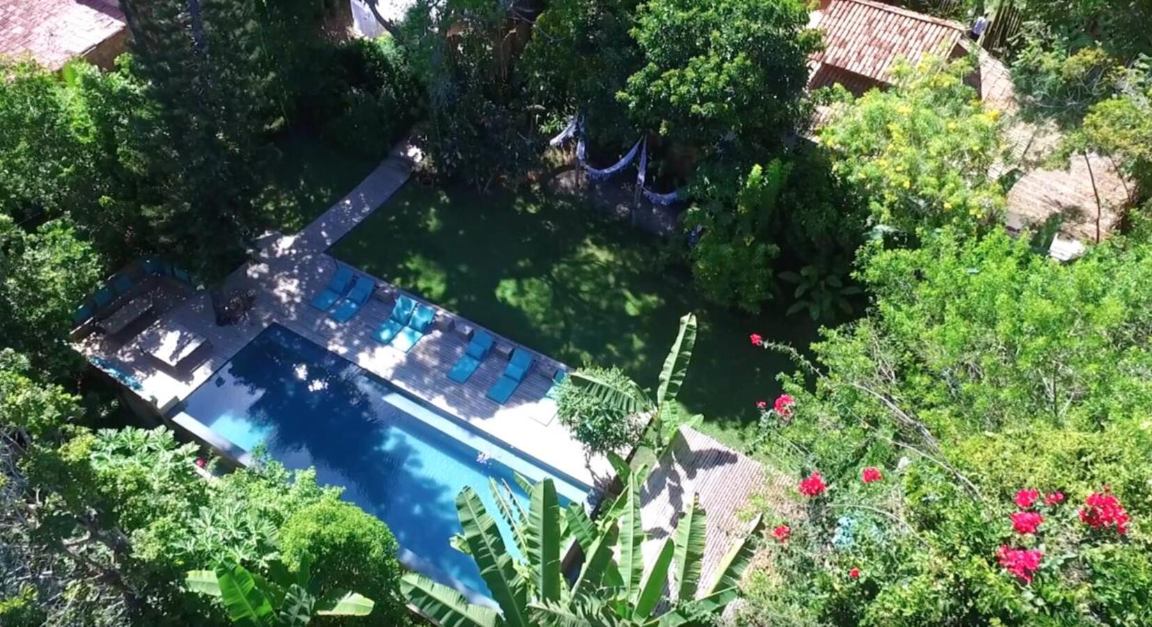 Aerial view of hotel pool and gardens