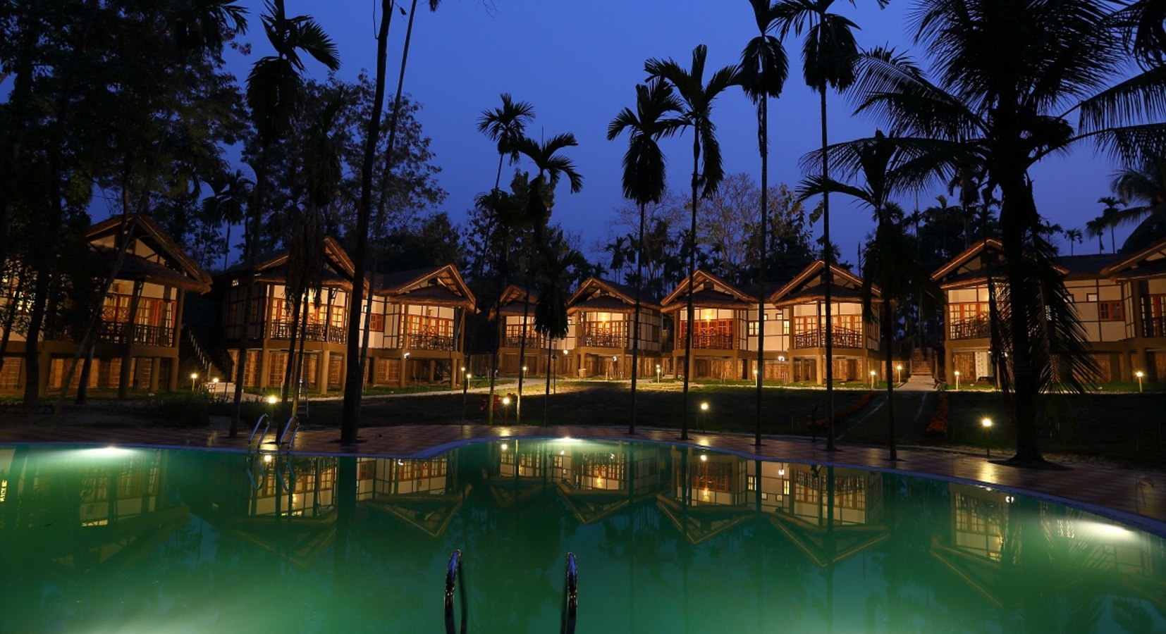 Pool and exterior by night