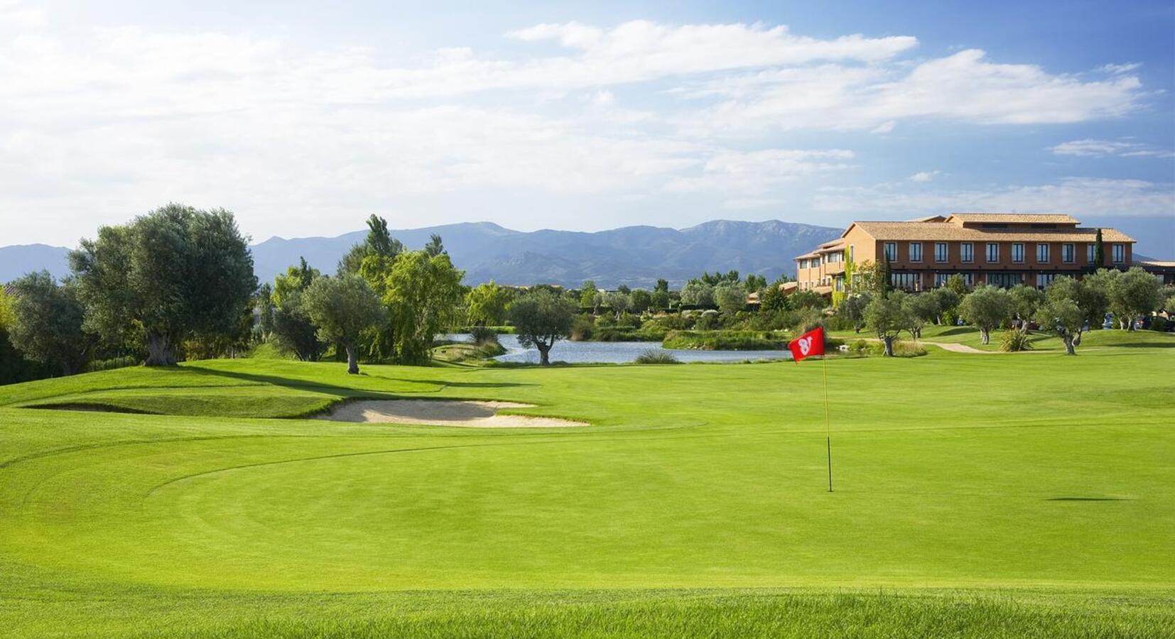 Hotel exterior and golf course view