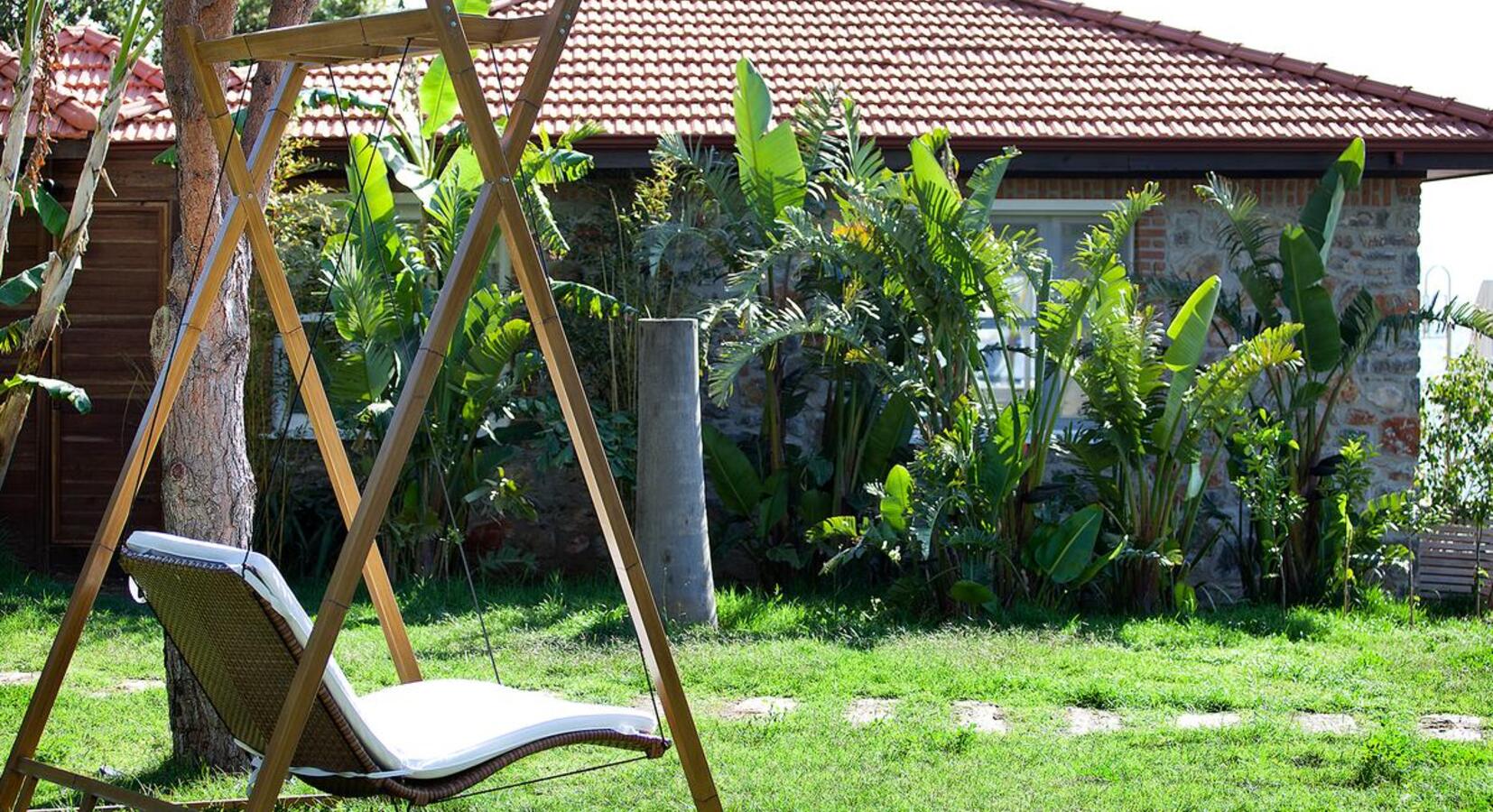 Swinging chair in the garden