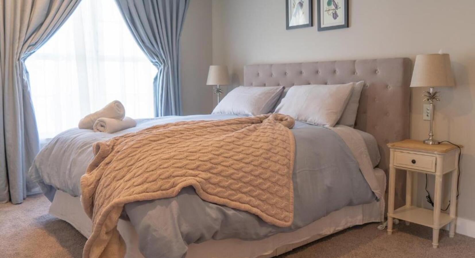 Double Bedroom with Blue Curtains