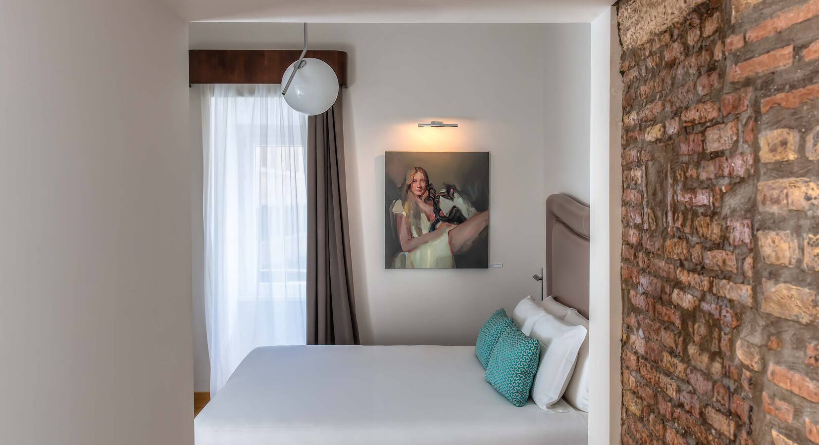 Junior Suite Tor Sanguigna tower with Evita Andujar artwork