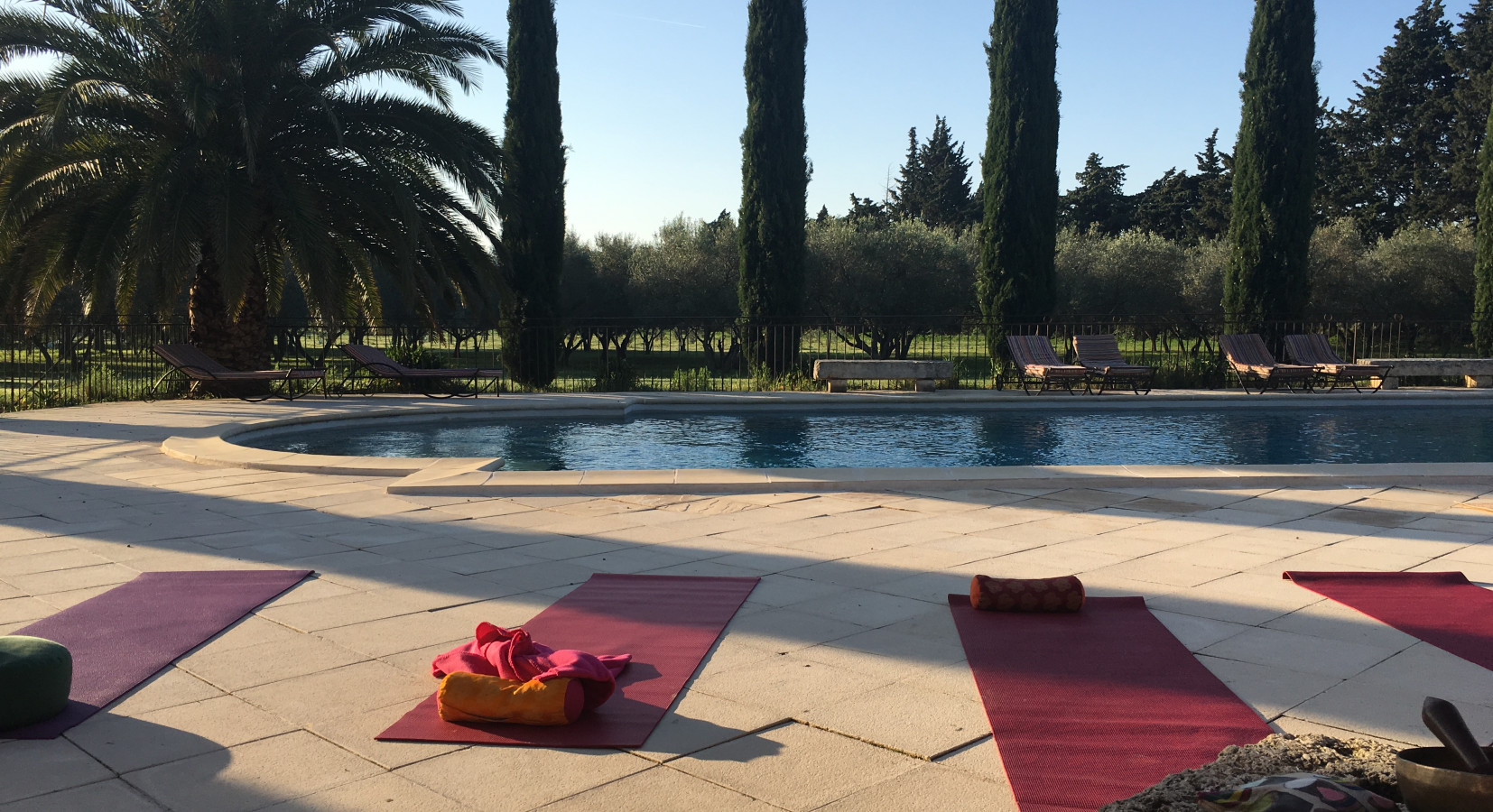 yoga class by the pool